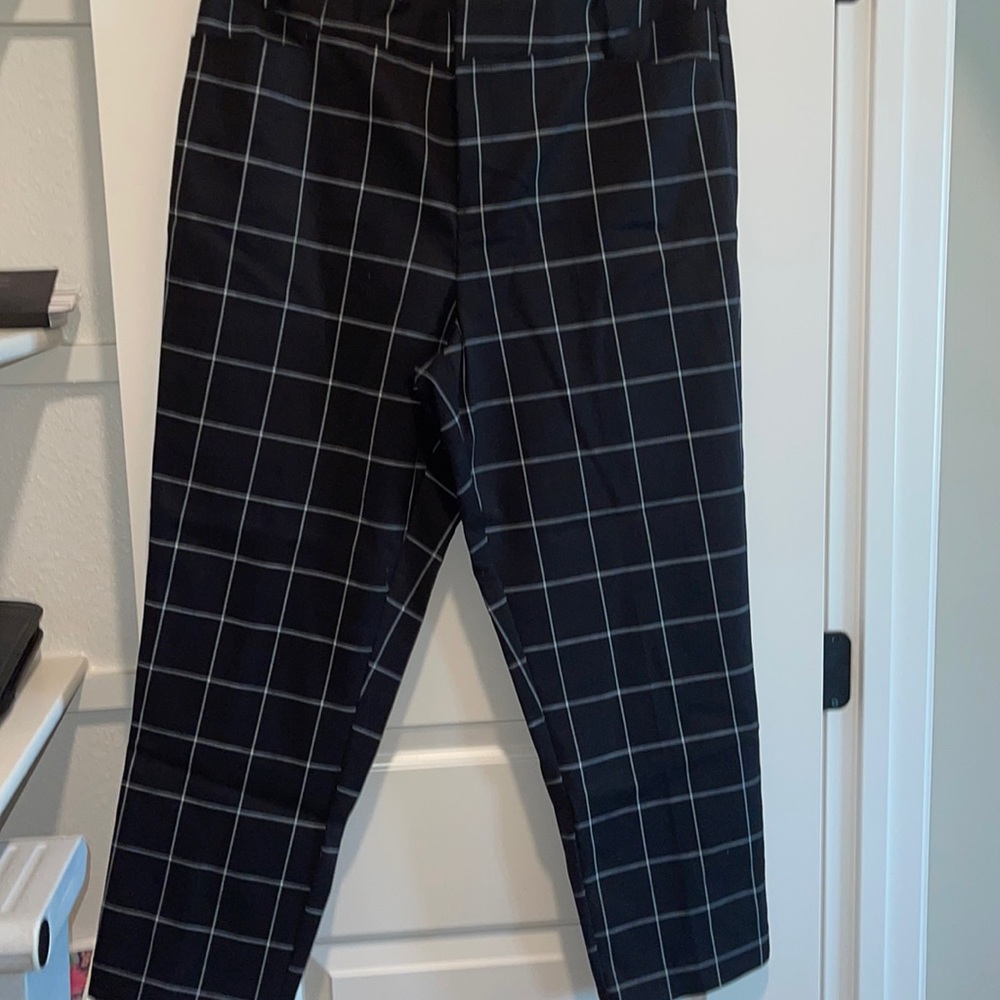 Black and white checked slacks